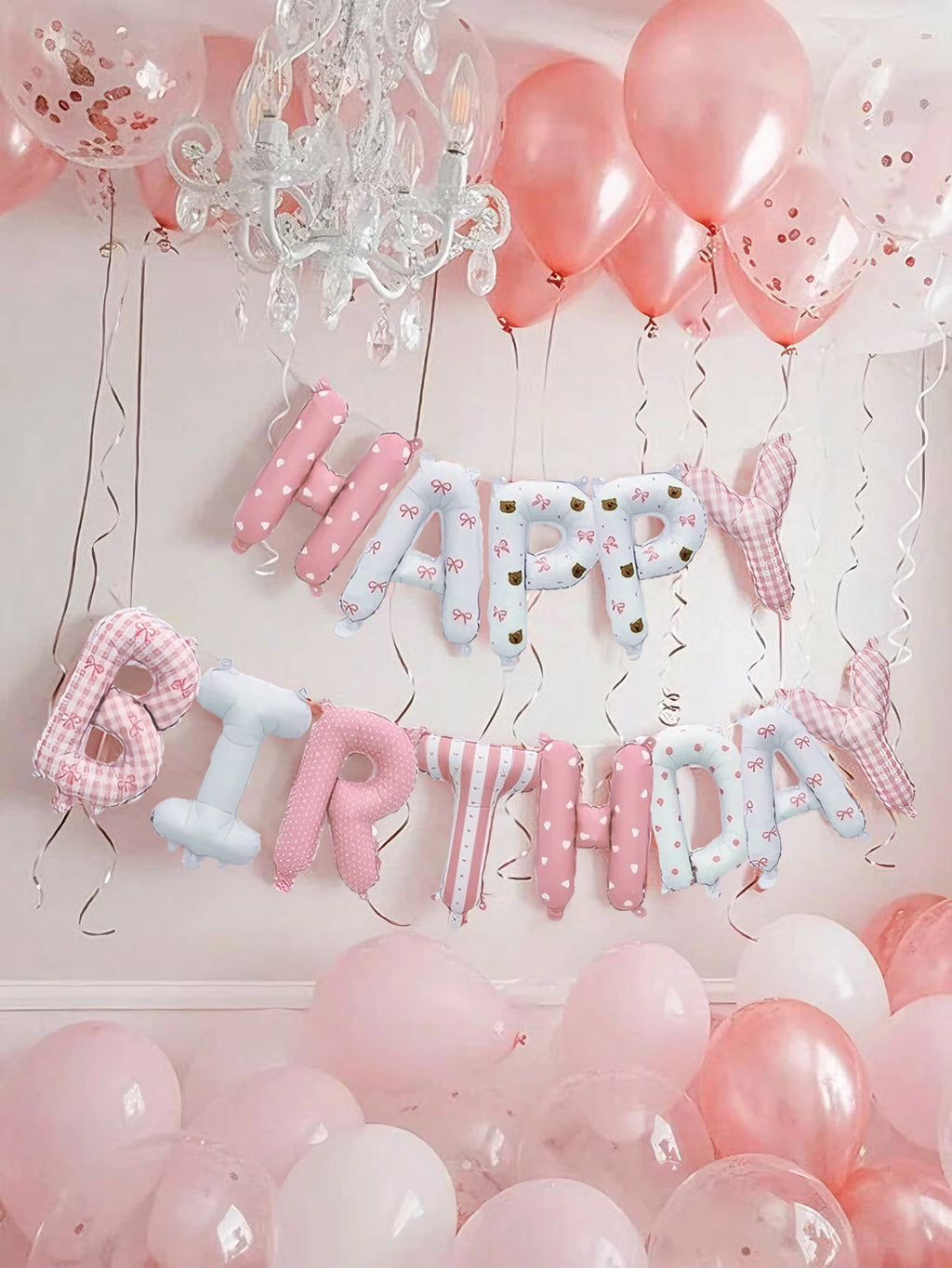 28-piece pink floral birthday set includes a floral "Happy Birthday" banner, pink latex balloons, and is suitable for birthday