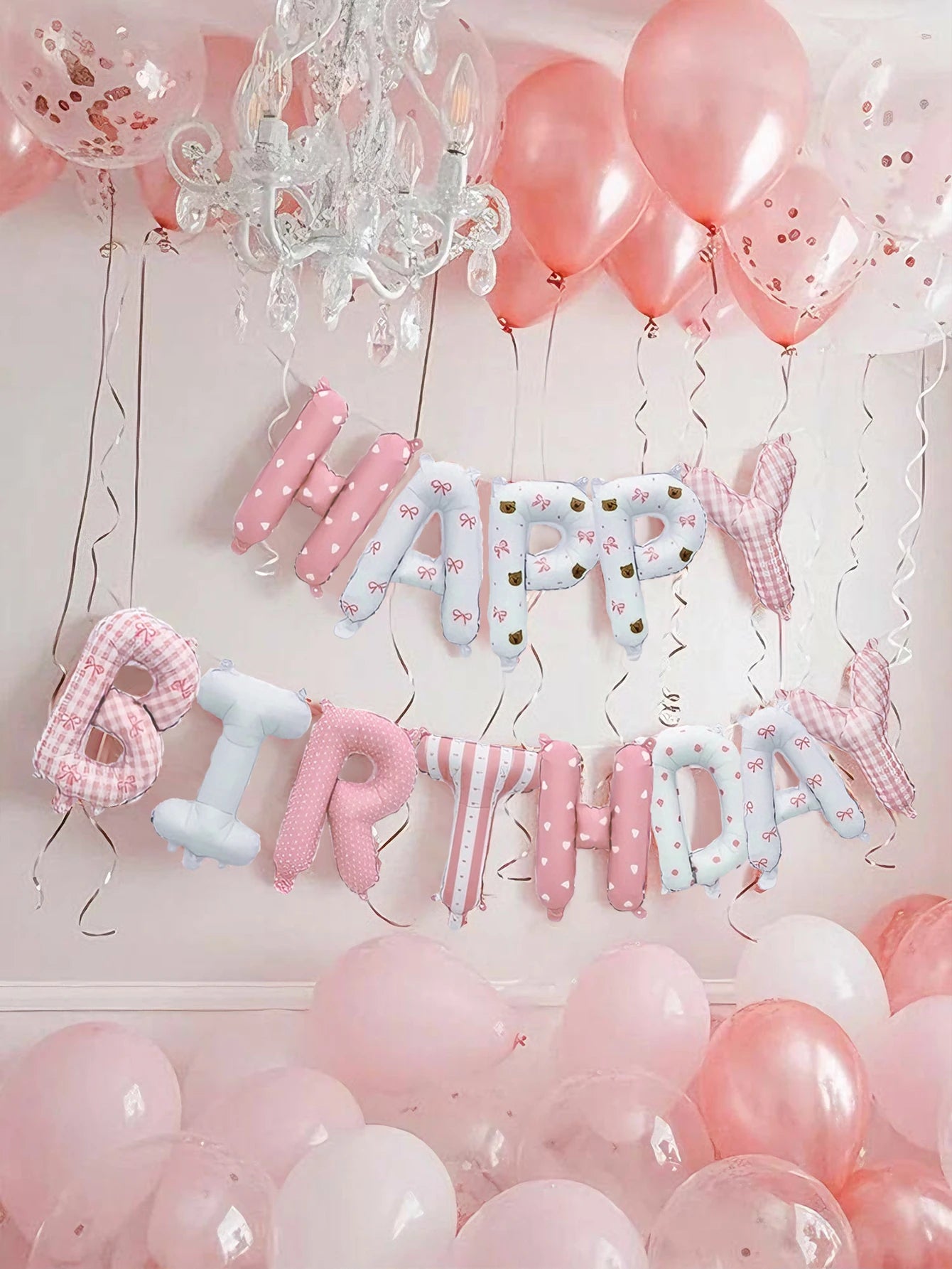 28-piece pink floral birthday set includes a floral "Happy Birthday" banner, pink latex balloons, and is suitable for birthday