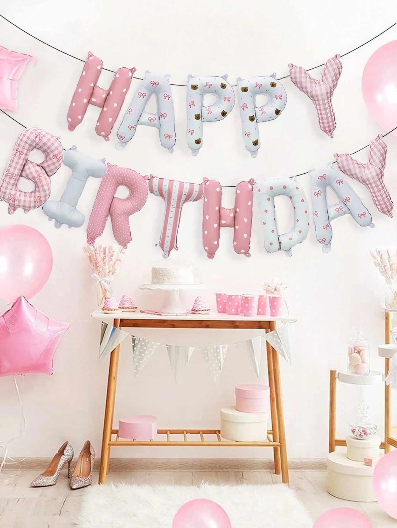 28-piece pink floral birthday set includes a floral "Happy Birthday" banner, pink latex balloons, and is suitable for birthday